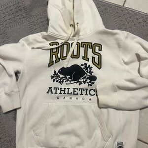 Roots White Hoodie with Black and Gold Accents